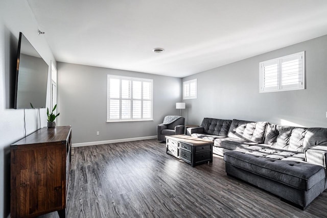 living room with dark wood-type flooring