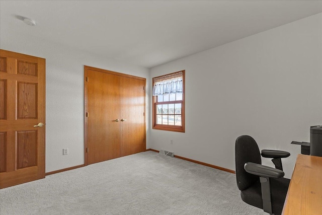 home office with light colored carpet