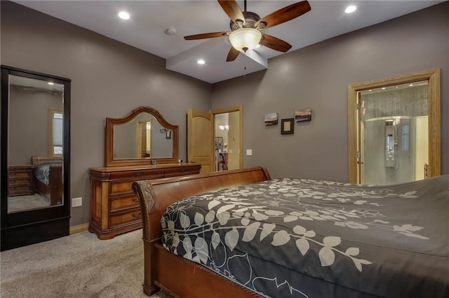 carpeted bedroom featuring ceiling fan and connected bathroom