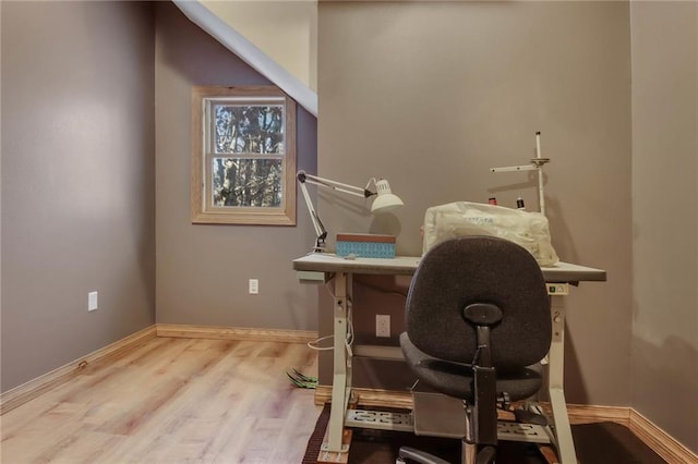 office space with light hardwood / wood-style floors