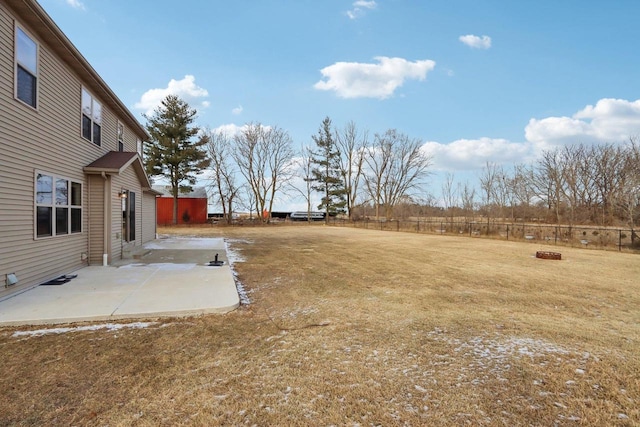 view of yard with an outdoor fire pit and a patio