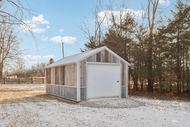 view of outbuilding featuring a garage