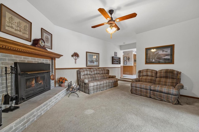 living room featuring ceiling fan and light colored carpet