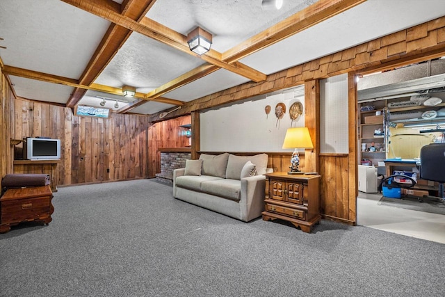 living room featuring a textured ceiling, carpet flooring, beam ceiling, and coffered ceiling