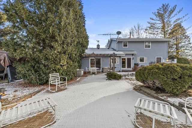 view of front of house with a patio