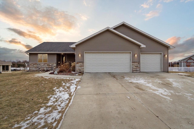 ranch-style home with a garage