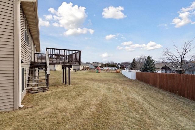 view of yard with a wooden deck