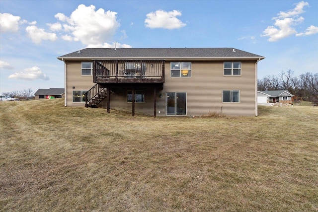 back of house with a deck and a yard