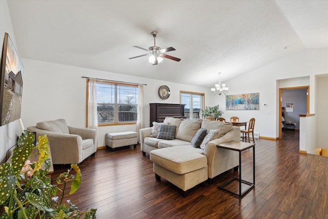 living room featuring ceiling fan with notable chandelier, dark hardwood / wood-style flooring, and lofted ceiling