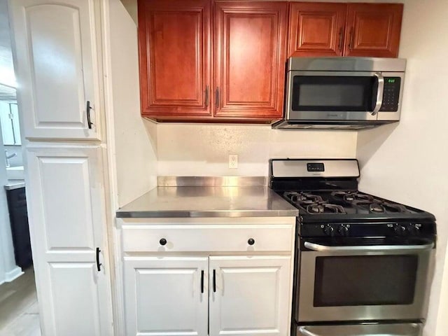 kitchen with stainless steel counters and stainless steel appliances