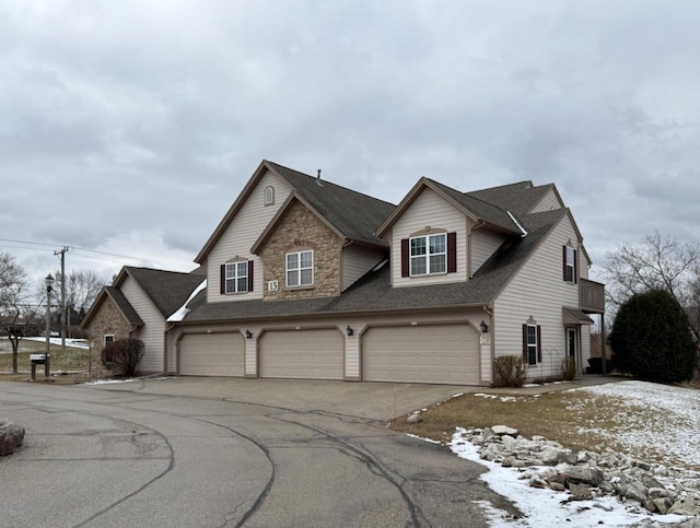 view of front of property featuring a garage