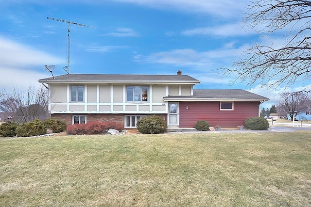 view of front of house with a front lawn