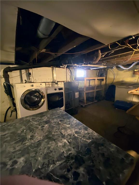 basement featuring washing machine and dryer