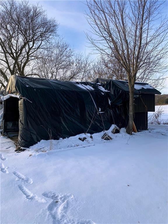 view of yard covered in snow