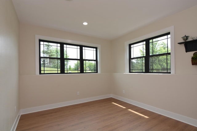 empty room featuring hardwood / wood-style floors