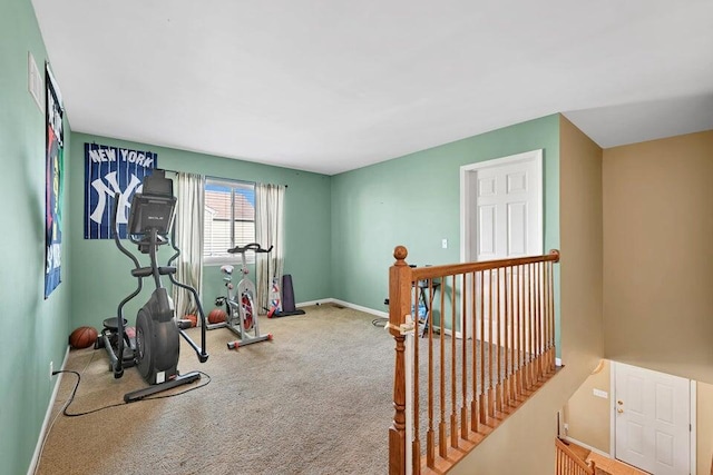 workout room featuring carpet floors