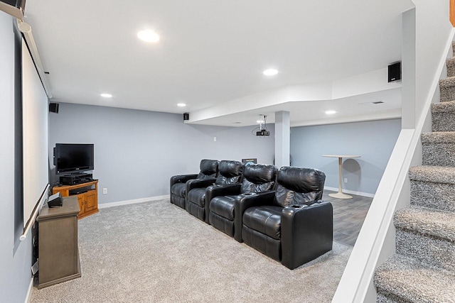 cinema room featuring carpet floors