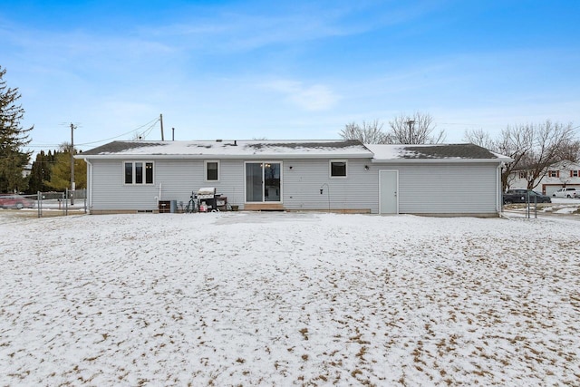 view of snow covered property