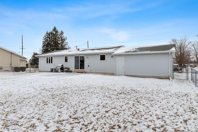 view of snow covered property