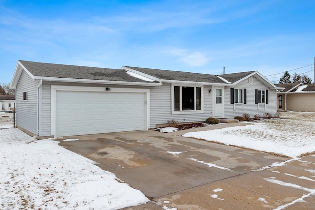 ranch-style house featuring a garage