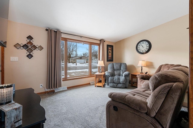 living room with vaulted ceiling and carpet flooring