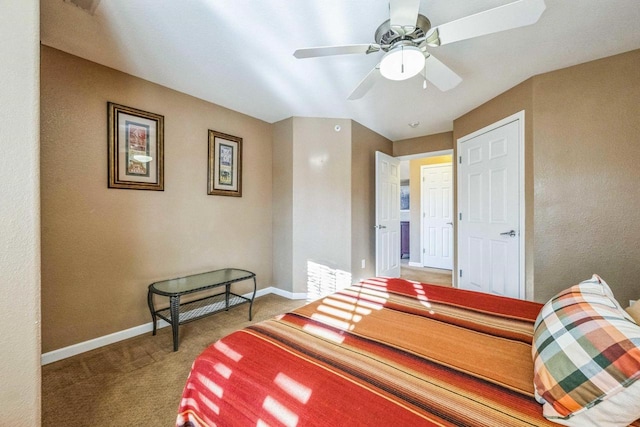 carpeted bedroom featuring ceiling fan