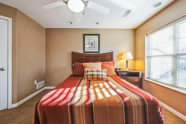 bedroom with ceiling fan and carpet flooring