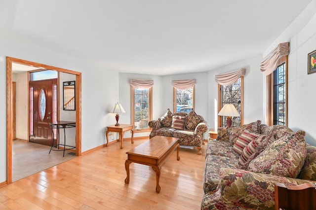 living room with light hardwood / wood-style floors