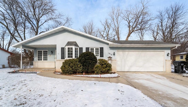 ranch-style home with a garage and covered porch