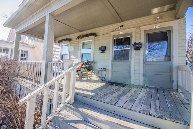 wooden deck featuring covered porch