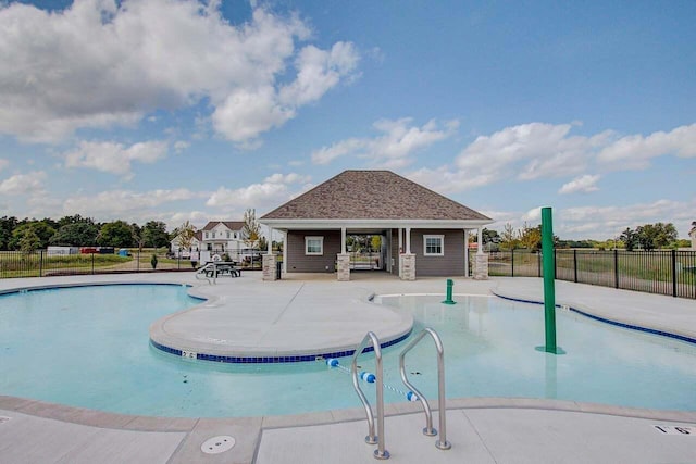 view of pool featuring a patio