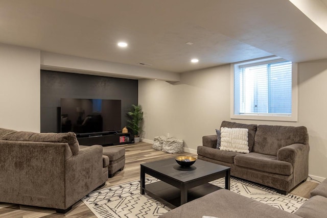 living room with light hardwood / wood-style floors