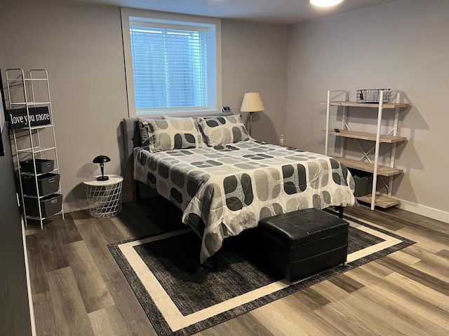 bedroom featuring hardwood / wood-style flooring