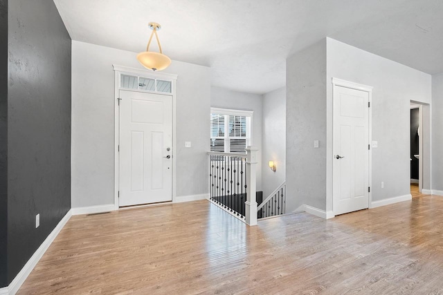 entrance foyer with light hardwood / wood-style flooring