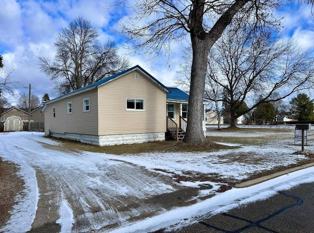 view of snow covered property