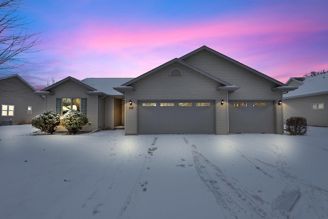 view of front of home with a garage