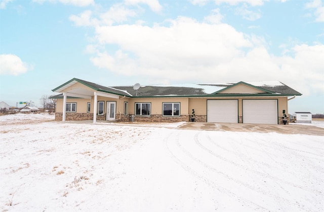 single story home featuring a garage