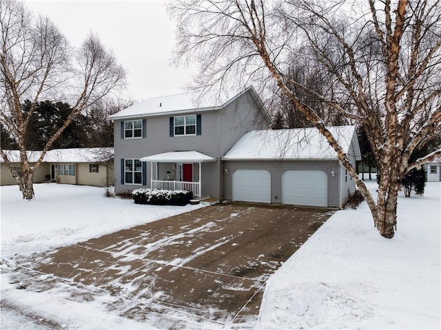 view of front of property with a garage and a porch