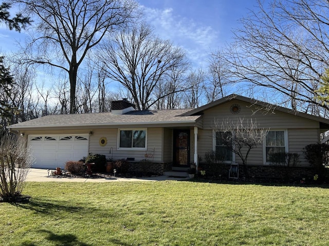 ranch-style house featuring a front yard and a garage