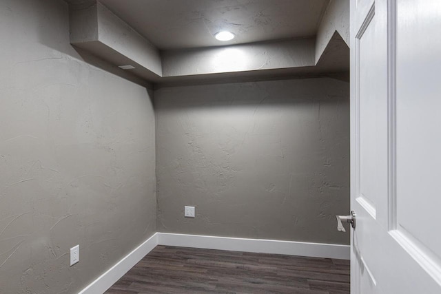 empty room featuring dark hardwood / wood-style floors