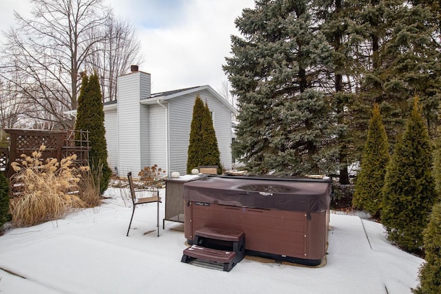 exterior space featuring a hot tub