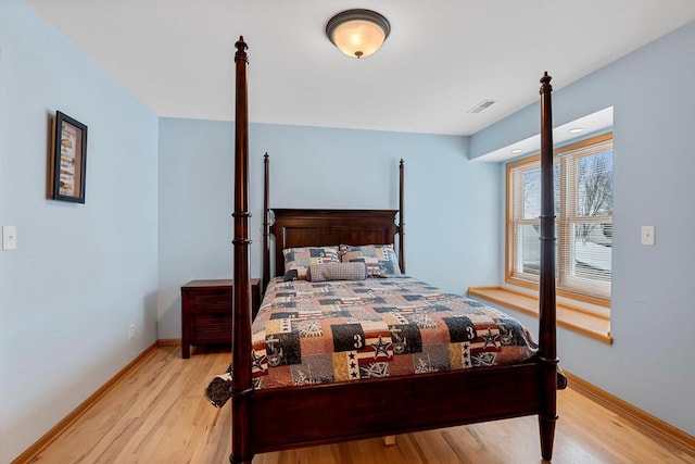 bedroom featuring light wood-type flooring