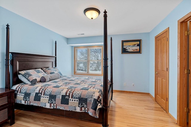 bedroom featuring light wood-type flooring