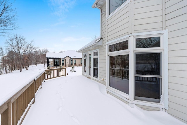 view of snow covered deck