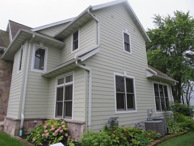 view of property exterior featuring central air condition unit