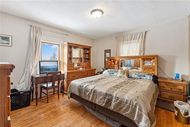 bedroom featuring light wood-type flooring