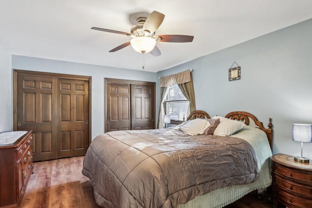 bedroom with ceiling fan and wood-type flooring