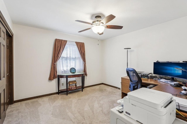 home office with ceiling fan and light colored carpet