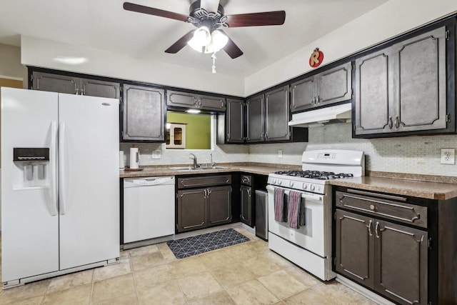 kitchen featuring ceiling fan, sink, white appliances, and tasteful backsplash