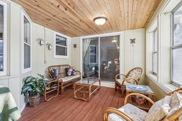 sunroom / solarium featuring wooden ceiling and plenty of natural light